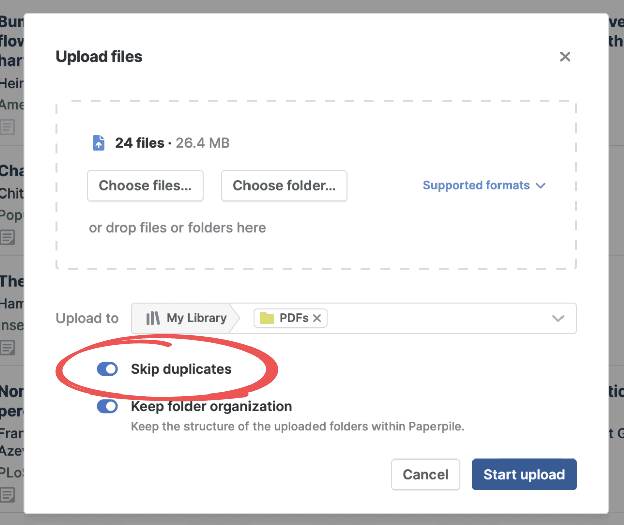 The Upload files dialog with 24 files totalling 26.4 MB queued for the PDFs folder, the “Skip duplicates” toggle circled in the on position and “Keep folder organization” switched on below it.